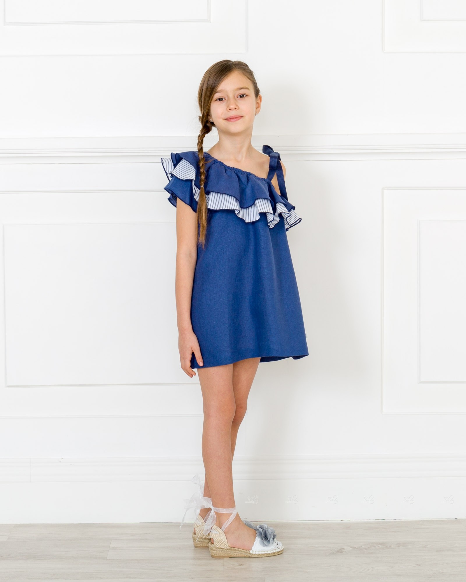 Las 10 prendas de ropa de niña imprescindibles en la maleta de